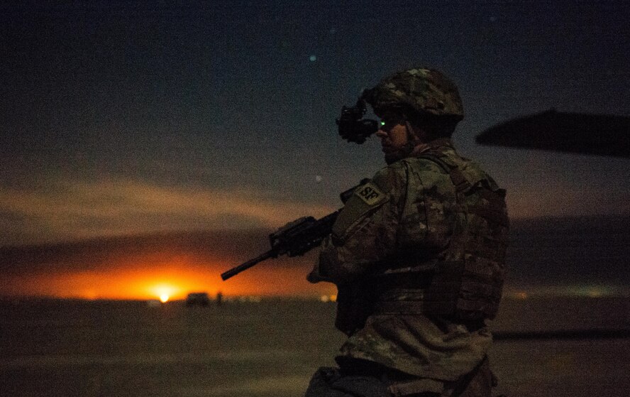 Senior Airman Henry Nokes, 386th Expeditionary Security Forces Squadron Fly-Away Security Team member, secures a section of airfield outside a C-130 Hercules at an undisclosed location in Southwest Asia, Feb. 4, 2017. Nokes was responsible for securing a flank of the aircraft while Airmen with the 737th Expeditionary Airlift Squadron delivered thousands of pounds in supplies to aid in the fight against the Islamic State of Iraq and the Levant and Mosul offensive. (U.S. Air Force photo by Senior Airman Jordan Castelan)