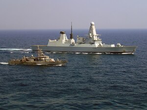 From left, Coastal patrol ship USS Monsoon (PC 4) and French Marine Nationale anti-air frigate FS Forbin (D620) participate sail side by side during exercise Khunjar Haad. Khunjar Haad is an annual, multilateral exercise conducted with the Royal Navy of Oman, Royal Navy and French Marine Nationale designed to develop the necessary skills to address threats to freedom of navigation and international commerce. USS Monsoon is deployed in the U.S. 5th Fleet area of operations in support of maritime security operations designed to reassure allies and partners, preserve the freedom of navigation and the free flow of commerce and enhance regional stability.