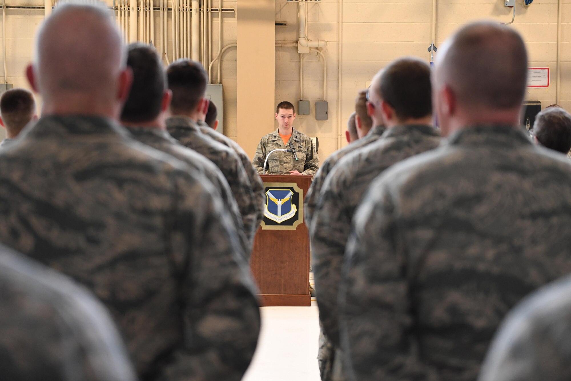Capt. Dustin Pope, commander of the 911th Maintenance Squadron, addresses his Airmen during an assumption of command ceremony at the Pittsburgh International Airport Air Reserve Station, Feb. 12, 2017. Pope, a long-standing member of the 911th Airlift Wing, assumed command of the squadron from Maj. William Chapman. (U.S. Air Force photo by Staff Sgt. Marjorie A. Bowlden)