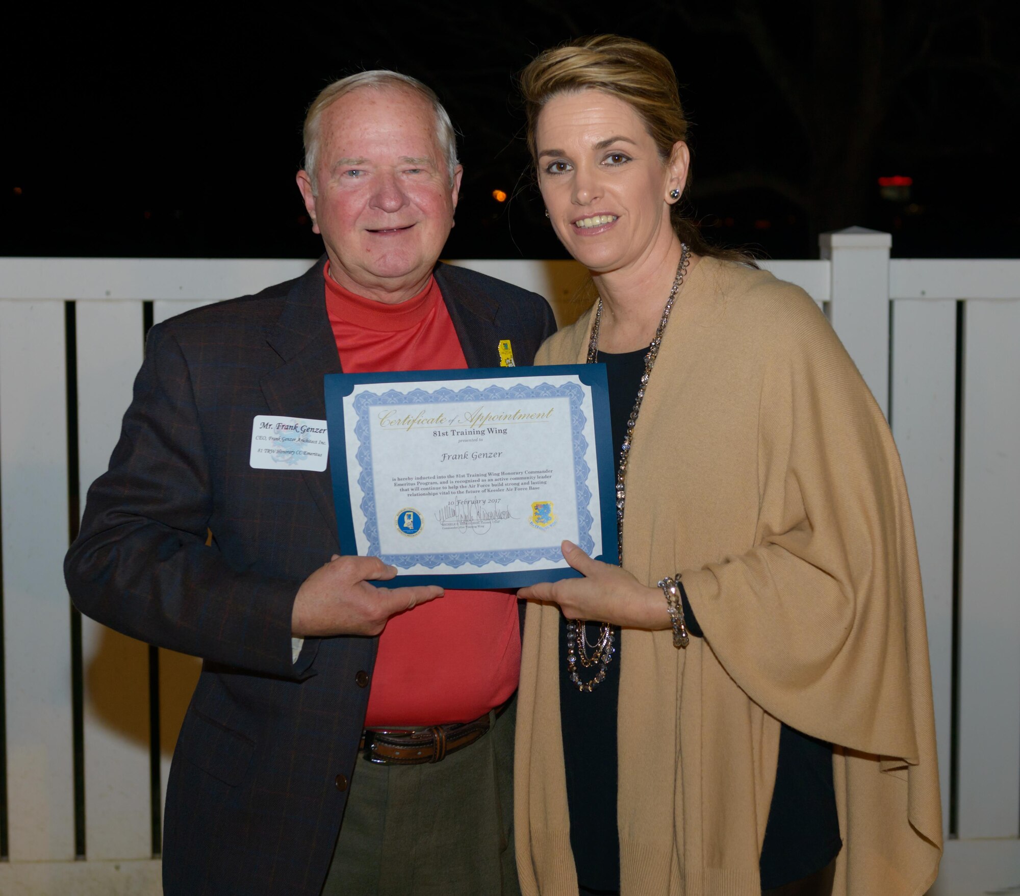 Frank Genzer, CEO and owner of Frank Genzer Architect Inc., and Col. Michele Edmondson, 81st Training Wing commander, pose for a photo during the 81st TRW Honorary Commander Program induction ceremony Feb. 10, 2017, on Keesler Air Force Base, Miss. As part of the ceremony Genzer, became the first honorary commander inducted into the Emeritus Program. This program allows honorary commanders who were instrumental to the success of the program to continue having a close relationship with the installation after their time as an honorary commander ends. (U.S. Air Force photo by Andre’ Askew)