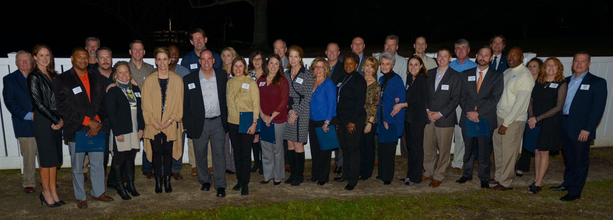 Leadership from the 81st Training Wing pose for a photo with their honorary commanders and spouses during the 81st TRW’s Honorary Commander Program induction ceremony Feb. 10, 2017, at Keesler Air Force Base, Miss. The Honorary Commander Program is a tool to help military and community leaders’ partner together to increase base involvement in civic endeavors and organizations and to further local community members’ understanding of the base’s mission. During the ceremony 14 local leaders became honorary commanders. (U.S. Air Force photo by Andre’ Askew) 