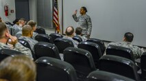 Chief Master Sgt. Shelina Frey, command chief of Air Mobility Command, speaks to attendees of the 521st Air Mobility Wing commander’s conference on Ramstein Air Base, Germany, Feb. 14, 2017. Frey encouraged the commanders, superintendents and first sergeants present to remember the “I,” the person who voluntarily took the oath to defend and protect the United States. (U.S. Air Force photo/Staff Sgt. Timothy Moore)
