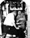 Airman 1st Class Donald G. Farrell, talks with Fenten Duepner, an electronic engineer at the Air Force School of Aviation Medicine, during a pre-ascension briefing at Randolph Air Force Base. Farrell is inside the small shell in which he began a seven-day journey into the unknown on Feb. 9, 1958. The space cabin is designed to duplicate the conditions Farrell might encounter if he were on a trip to the moon. 

Photo Credit, United Press, Feb. 9, 1958
