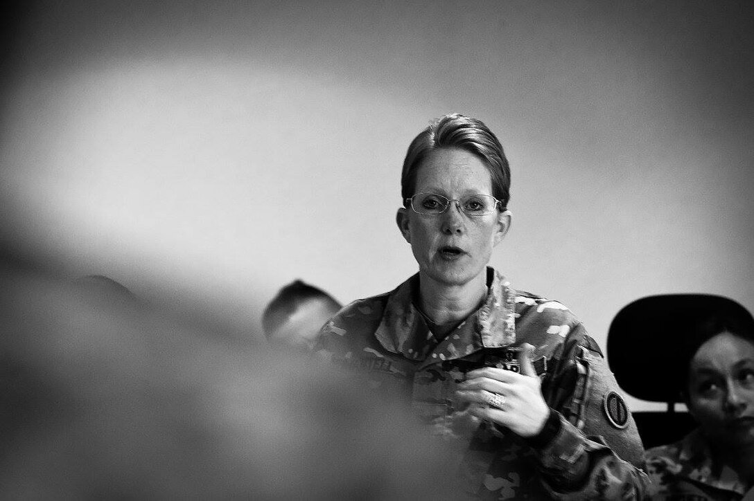 Col. Susan Mantell, Command Surgeon, explains the transgender medical process within the Army during the command's weekend training, Feb. 11, 2017. The brief was part of initial steps in assisting transgender Soldiers in their gender transition, help commanders with their duties and responsibilities, and help Soldiers understand new policies enabling the open service of transgender Soldiers.
(Photo by Sgt. Aaron Berogan)