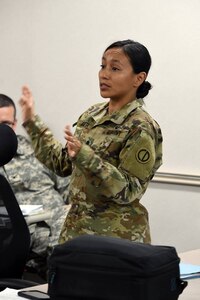 Army Reserve Lt. Col. Vickie Argueta, Equal Opportunity Advisor, 85th Support Command, shares remarks during a Command Climate post survey brief to the command's Soldiers, Feb. 11, 2017. The Command Climate survey gave the Soldiers and Civilians, assigned to the command, the opportunity to provide their input on areas for command leadership to focus its attention on-- in regards to human relations climate of the organization.
(Photo by Sgt. Aaron Berogan)