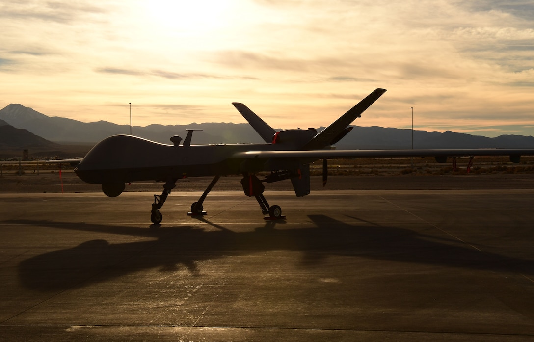 A U.S. Air Force MQ-9 Reaper awaits maintenance Dec. 8, 2016, at Creech Air Force Base, Nev. The MQ-1 Predator has provided many years of service and the time has come for the Air Force to transition to the more capable MQ-9 exclusively, and retire the MQ-1 in early 2018 to keep up with the continuously evolving battlespace environment. (U.S. Air Force photo by Senior Airman Christian Clausen) 