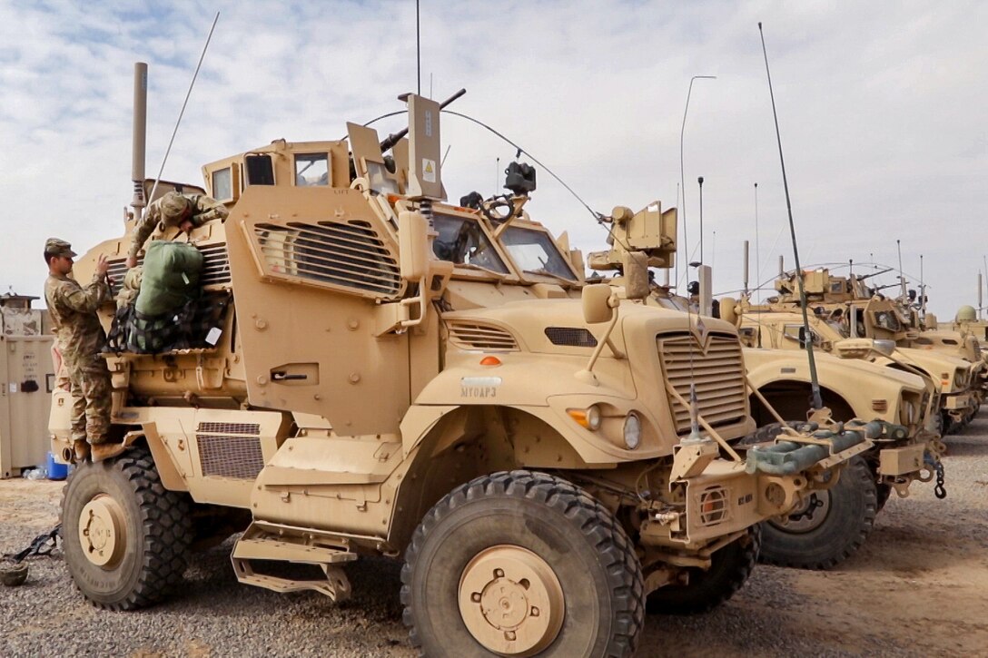Soldiers load their truck at Qayyarah West Airfield, Iraq, Feb. 17, 2017, and prepare for a tactical movement to Hamam al-Alil. The soldiers are paratroopers assigned to the 82nd Airborne Division’s 1st Squadron, 73rd Cavalry Regiment, 2nd Brigade Combat Team, which is supporting Combined Joint Task Force Operation Inherent Resolve. Army photo by Staff Sgt. Jason Hull