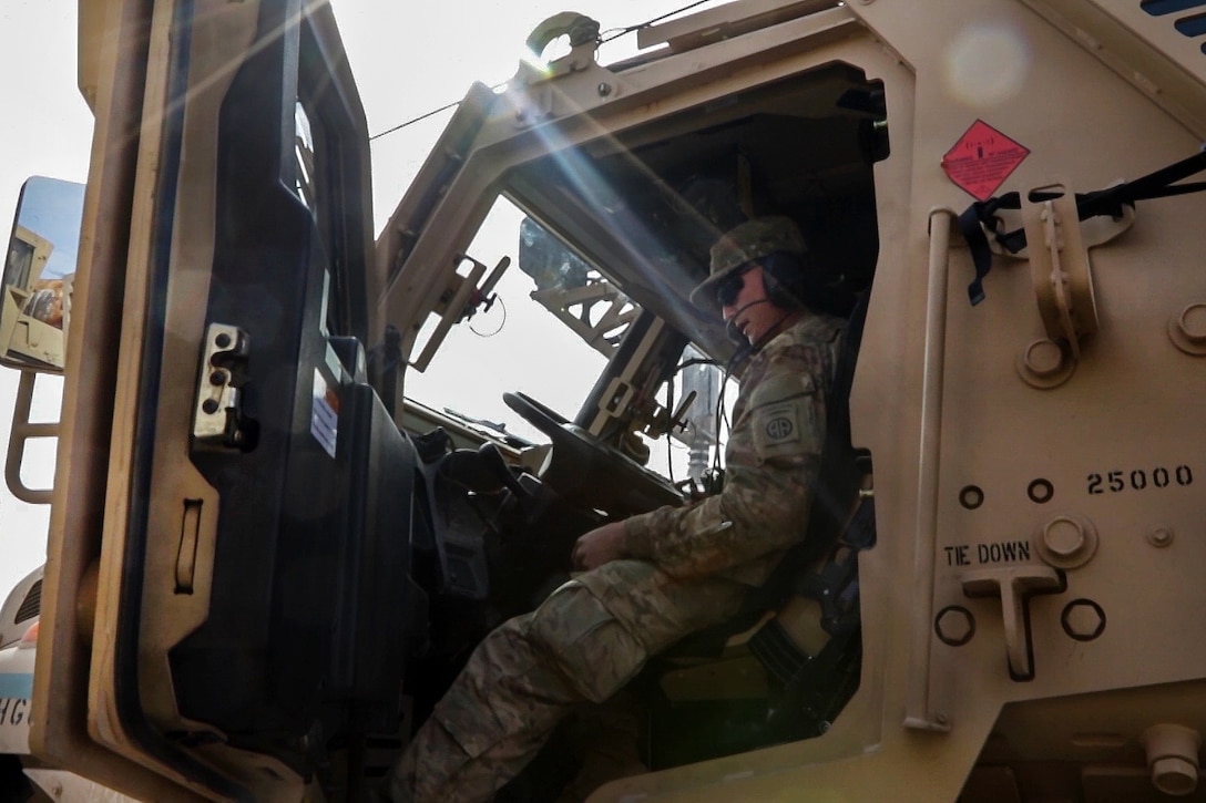 Army Pvt. James Childs performs a radio check at Qayyarah West Airfield, Iraq, Feb. 17, 2017, before moving out to Hamam al-Alil. Childs is a cavalry scout assigned to the 82nd Airborne Division’s 1st Squadron, 73rd Cavalry Regiment, 2nd Brigade Combat Team. Army photo by Staff Sgt. Jason Hull