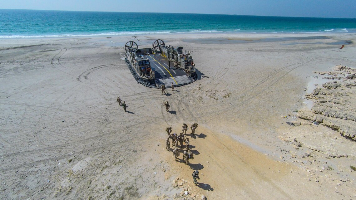 U.S. Marines and Sailors with the Makin Island Amphibious Ready Group and 11th Marine Expeditionary Unit offload from a Landing Craft Air Cushion at Senoor Beach, Oman, before the beginning of Exercise Sea Soldier, Feb. 15. Sea Soldier 2017 is an annual, bilateral exercise conducted with the Royal Army of Oman designed to demonstrate the cooperative skill and will of U.S. and partner nations to work together in maintaining regional stability and security. USS Somerset, with the embarked 11th Marine Expeditionary Unit, is deployed in the U.S. 5th Fleet area of operations in support of maritime security operations designed to reassure allies and partners, preserve the freedom of navigation and the free flow of commerce and enhance regional stability.