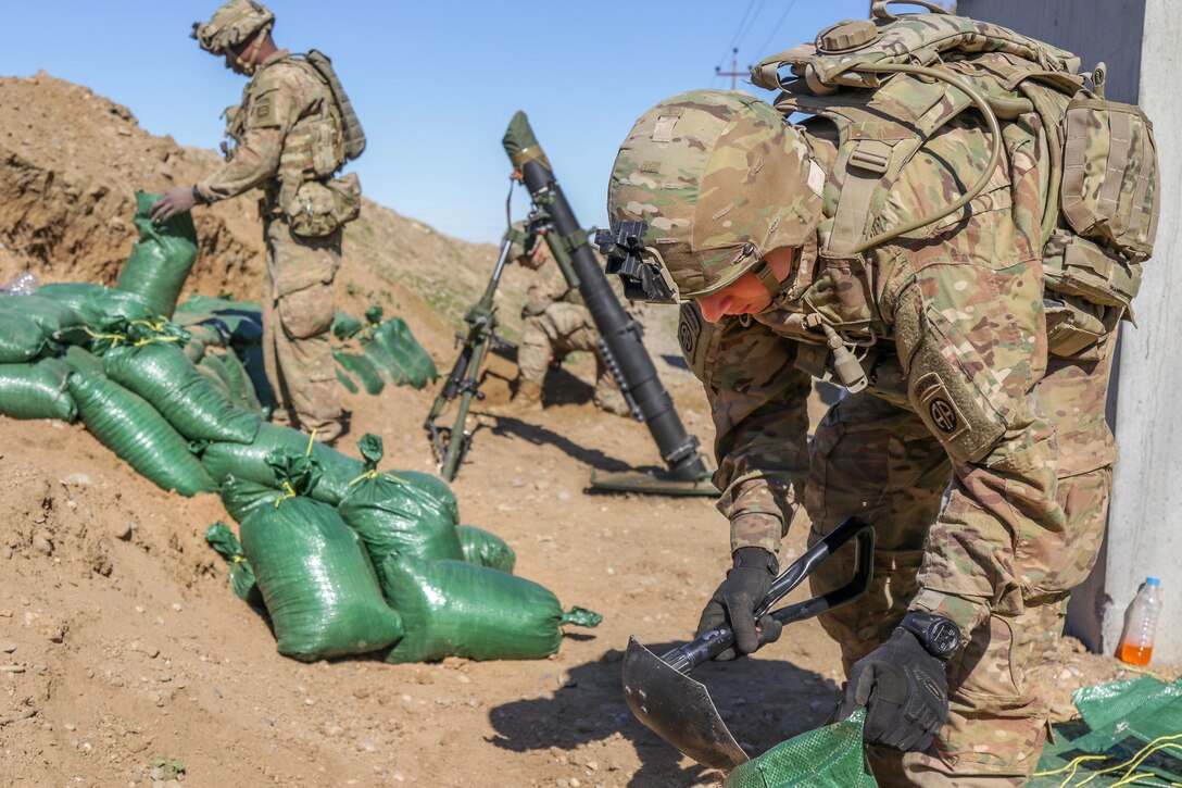 Paratroopers build mortar positions and reinforce them using sandbags at Hamam al-Alil, Iraq, Feb. 18, 2017. The paratroopers are mortar men assigned to the 82nd Airborne Division’s 1st Squadron, 73rd Cavalry Regiment, 2nd Brigade Combat Team. Army photo by Staff Sgt. Jason Hull