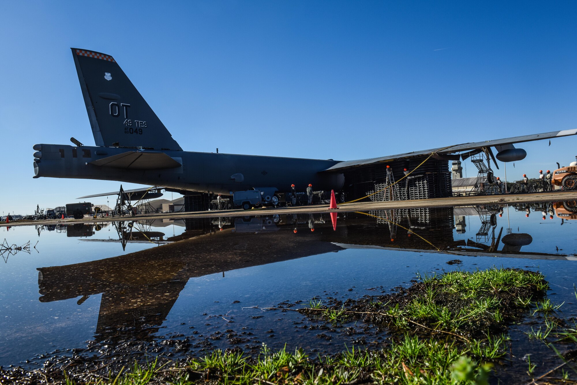 Air pressure valves are used to control and monitor the pressure in air lifts under a B-52 Stratofortress at Barksdale Air Force Base, La., Feb. 16, 2017. Three Airmen monitoring each of system had to communicate via radio to ensure the lifts remained balanced between each wing. (U.S. Air Force photo/Senior Airman Luke Hill)