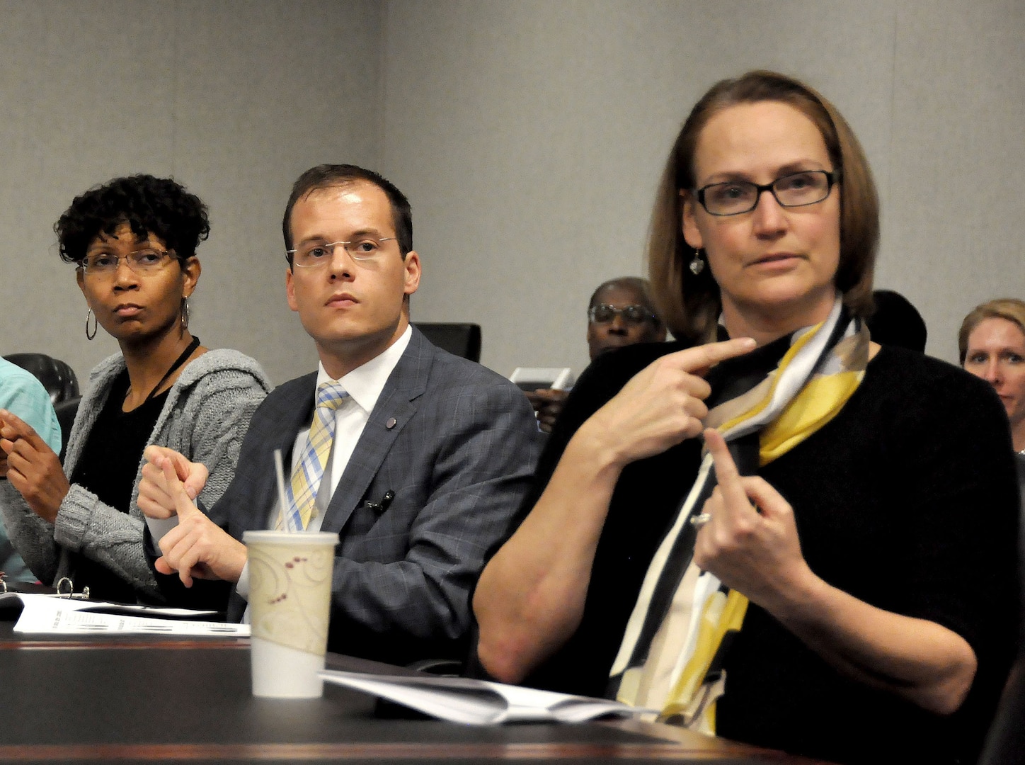 From left, Towana Barnett, Defense Technical Information Center, Christopher Kehoe, DLA Equal Employment Opportunity Office and Janice Sypolt, DLA Logistics Operations, participate in the DLA lunchtime American Sign Language class.