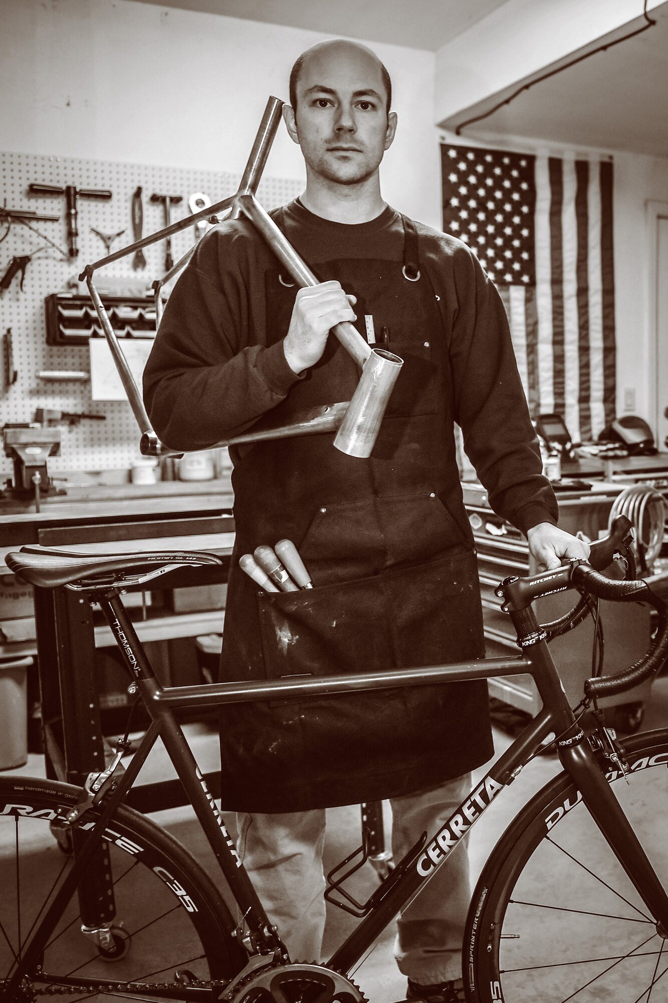 Air Force 1st Lt. Ken Cerreta poses with a nearly complete frame built over approximately 80 hours in his garage. (Paul Holcomb/U.S. Air Force)