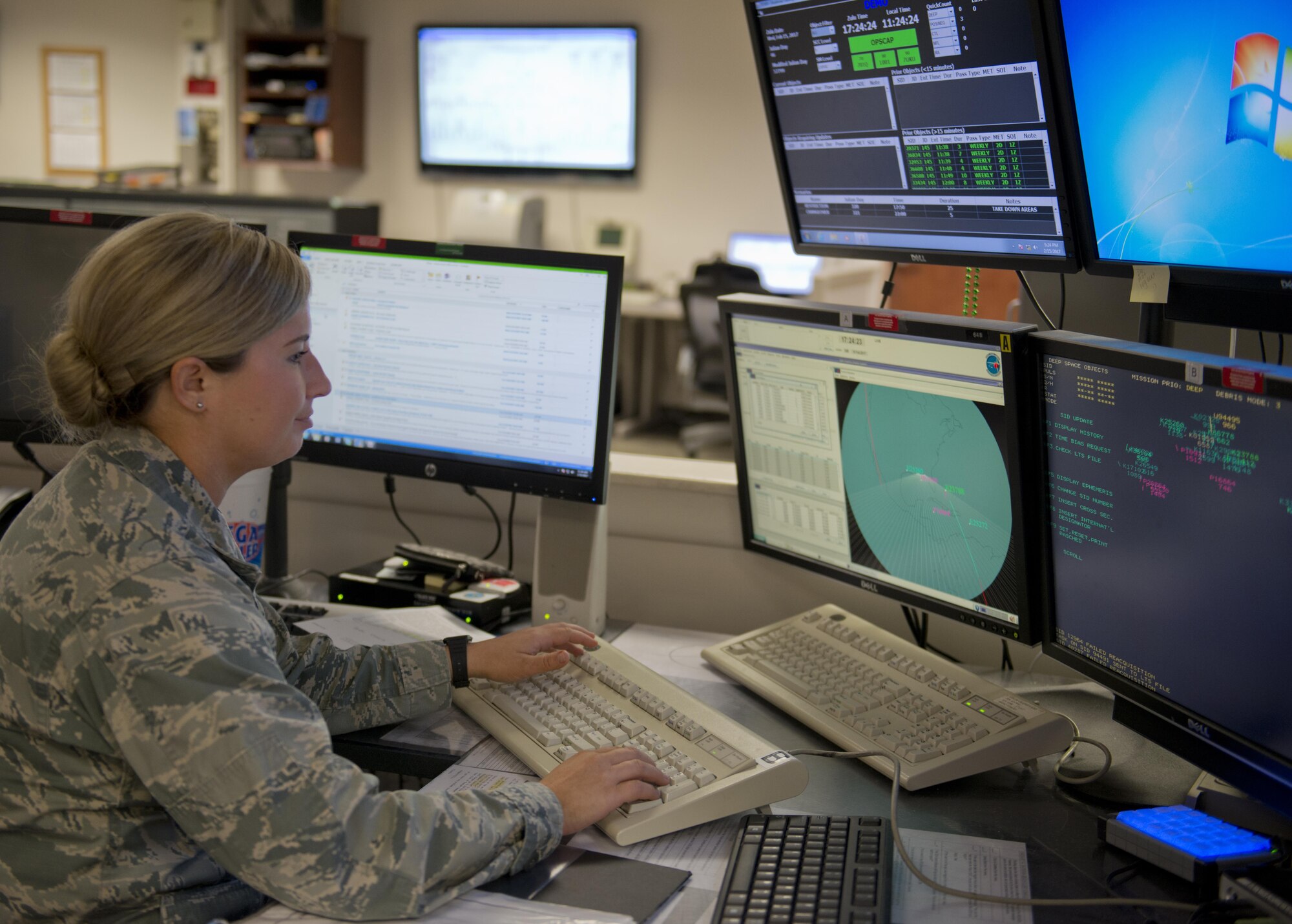 2nd Lt. Lauren Bauer, 20th Space Control Squadron crew commander, tracks objects within their radar’s field of view during India's Polar Satellite Launch Vehicle launch Feb. 15 at Eglin Air Force Base, Fla. The Indian PSLV loaded with 104 satellites, set the record for the most spacecraft launched by a single rocket. (U.S. Air Force photo/Kristin Stewart)