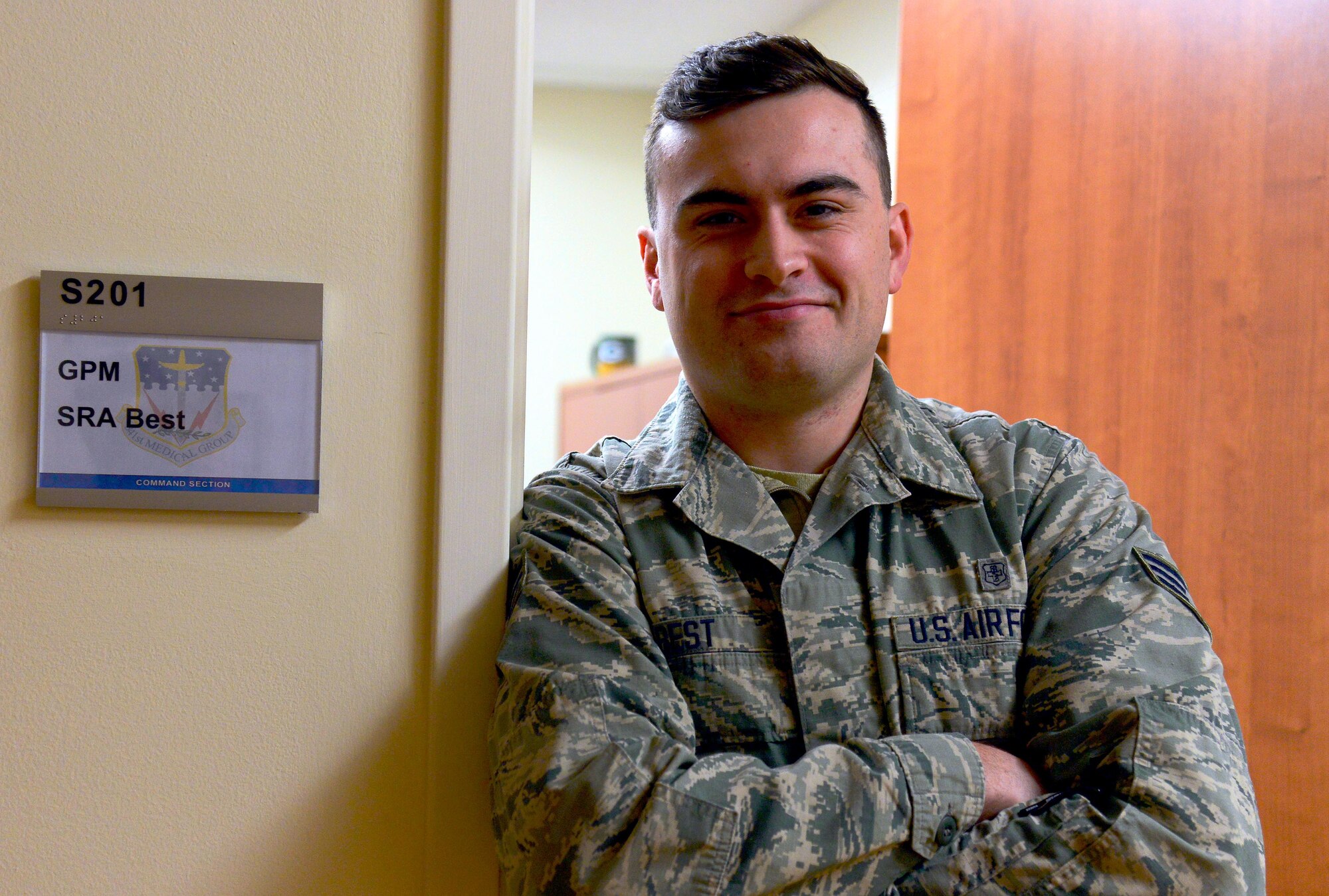 Senior Airman Cody Best, 341st Medical Operations Squadron family health clinic office manager, poses for a photo Feb. 22, 2017, at Malmstrom Air Force Base, Mont. Best helps patients get the care they need by booking appointments with the family health clinic. (U.S. Air Force photo/Airman 1st Class Magen M. Reeves)