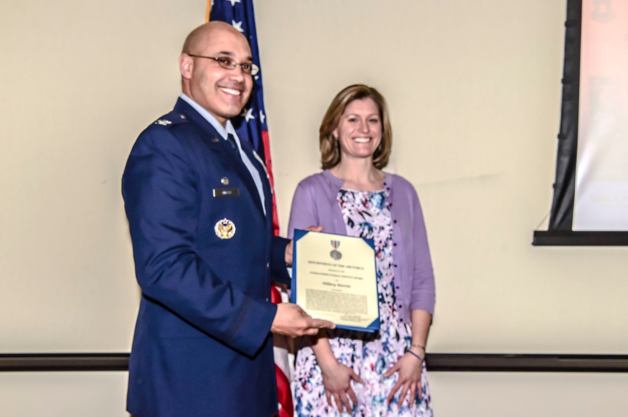 Hillary Merritt, project manager for The Trust for Public Land, was presented an Air Force level award Feb. 22, 2017 by Col. David Miller, Jr., 460th Space Wing commander, at the Aurora Municipal Center in Aurora, Colo. The Commander’s Public Service Award is
designed to recognize service or achievements of a private citizen who has contributed significantly to the accomplishment of the mission of an Air Force
Agency. (U.S. Air Force photo by Airman 1st Class Jessica A. Huggins/Released)