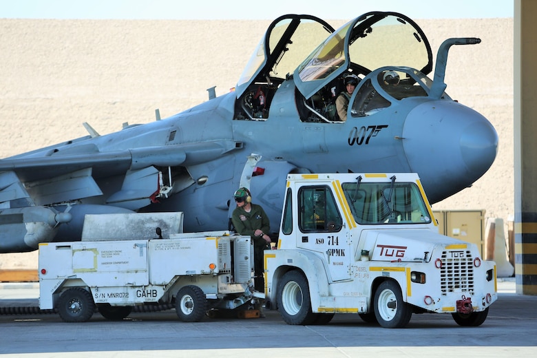 U.S. Marines with Marine Tactical Electronic Warfare Squadron 4, Special Purpose Marine Air Ground Task Force - Crisis Response - Central Command, prepare an EA-6B Prowler to conduct aerial maneuver training in the U.S. Central Command area of operations Nov. 11, 2014. The Marines and sailors of SPMAGTF-CR-CC serve as an expeditionary, crisis-response force tasked with supporting operations, contingencies and security cooperation in Marine Corps Forces Central Command and CENTCOM. (U.S. Marine Corps photo by 1st Lt. Matthew W. Finnerty/Released)