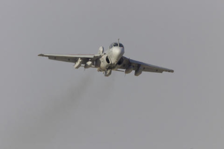 A United States Marine EA-6B Prowler stationed out of Cherry Point Marine Corps Air Station from VMA Q2 (Marine Technical Electronic Warfare Squadron 2) launches for combat exercises during Cope Tiger 2002 exercise held at Wing 1 Air Base Korat, Thailand. Air forces from the United States, Thailand, and Singapore, as well as U.S. Marines will participate in Exercise Cope Tiger 02 in Thailand from January 14-25, 2002. Cope Tiger is an annual, multinational exercise in the Asia-Pacific region. The flying training portion of the exercise promotes closer relations and enables air force units in the region to sharpen air combat skills and practice interoperability with. (U.S. Air Force photo by Tech. Sgt. Jeff Clonkey/Released)