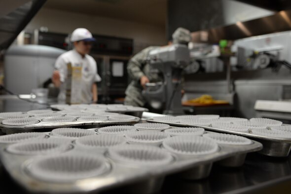 U.S. Air Force Airman 1st Class Guadalupe Estrada, a 354th Force Support Squadron (FSS) food service apprentice, and Staff Sgt. Erica Miller, a 354th FSS food service accountant, prepare cake batter Feb. 22, 2017, at Eielson Air Force Base, Alaska. The Two Seasons Dining Facility prepares cake and cupcakes for their quarterly birthday meal, recognizing the Airmen who have birthdays during the corresponding quarter. (U.S. Air Force photo by Airman 1st Class Cassandra Whitman)