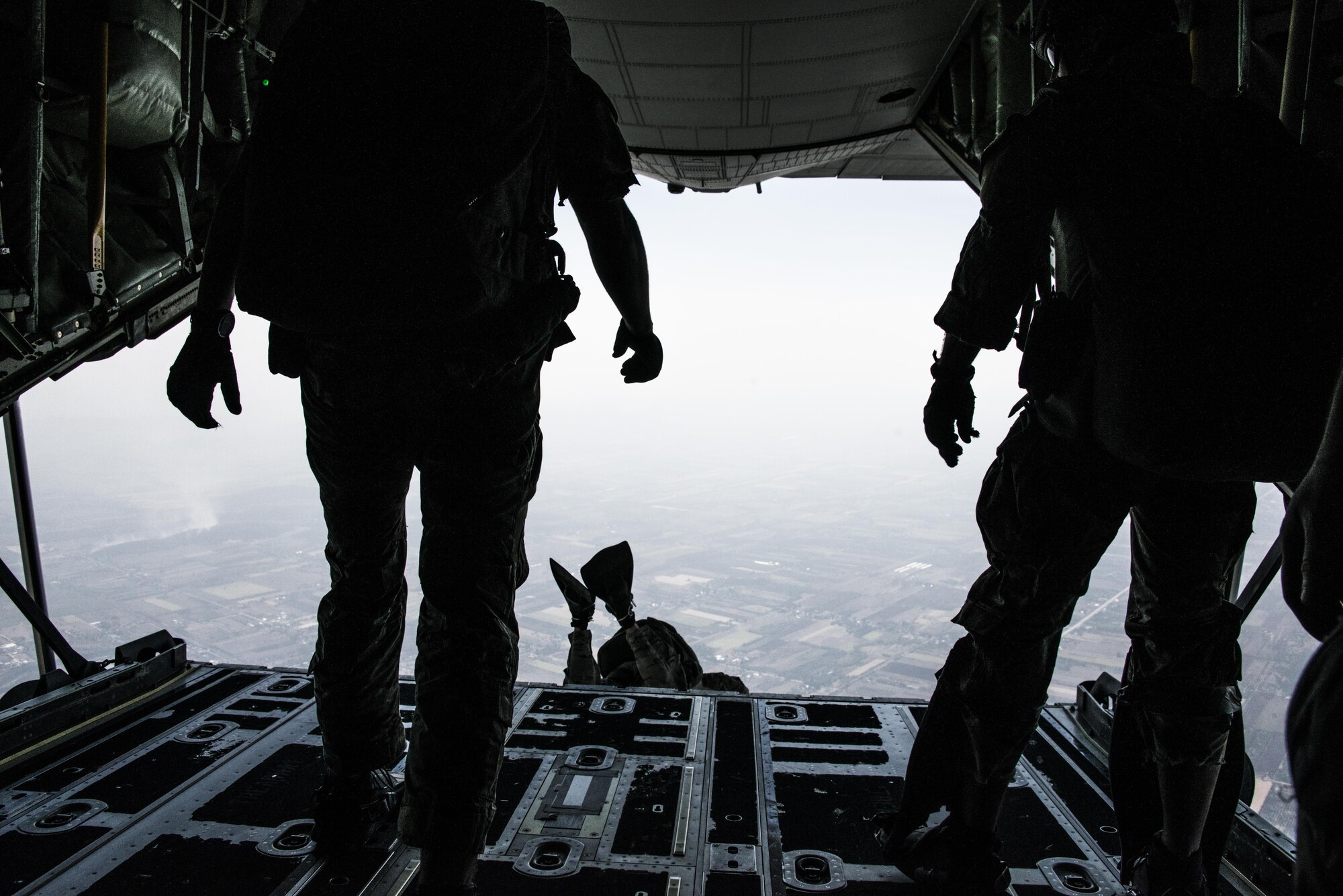U.S. Air Force pararescuemen from the 320th Special Tactics Squadron and counterparts from the Royal Thai Air Force Special Operations Regiment jump from a U.S. Air Force MC-130J Commando II assigned to the 17th Special Operations Squadron, Feb. 17, 2017 at Korat Air Base, Thailand. Executing jump operations throughout Cobra Gold 2017, the members of the 320th STS and RTAF SOR demonstrated the strength of a partnership that has evolved over the last 17 years. (U.S. Air Force photo by Capt. Jessica Tait)