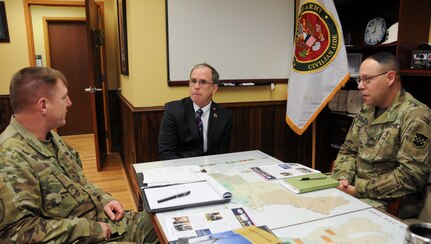 Maj. Gen. Troy D. Kok, commanding general of the U.S. Army Reserve’s 99th Regional Support Command (left), meets with Dr. Rory A. Cooper, civilian aide to the Secretary of the Army for Pennsylvania-West (center), and Col. Richard Erenbaum, 99th RSC congressional legislative liaison, at the command’s headquarters Feb. 23 on Joint Base McGuire-Dix-Lakehurst, New Jersey. CASAs are a vital part of the Army, promoting good relations between the Army and the public and advising the Secretary about regional issues. The 99th RSC provides facilities, logistics and personnel support to enhance the readiness of the 44,000 Army Reserve Soldiers in the command’s 13-state region stretching from Maine to Virginia.