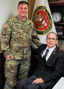 Maj. Gen. Troy D. Kok, commanding general of the U.S. Army Reserve’s 99th Regional Support Command (left), meets with Dr. Rory A. Cooper, civilian aide to the Secretary of the Army for Pennsylvania-West, at the command’s headquarters Feb. 23 on Joint Base McGuire-Dix-Lakehurst, New Jersey. CASAs are a vital part of the Army, promoting good relations between the Army and the public and advising the Secretary about regional issues. The 99th RSC provides facilities, logistics and personnel support to enhance the readiness of the 44,000 Army Reserve Soldiers in the command’s 13-state region stretching from Maine to Virginia.