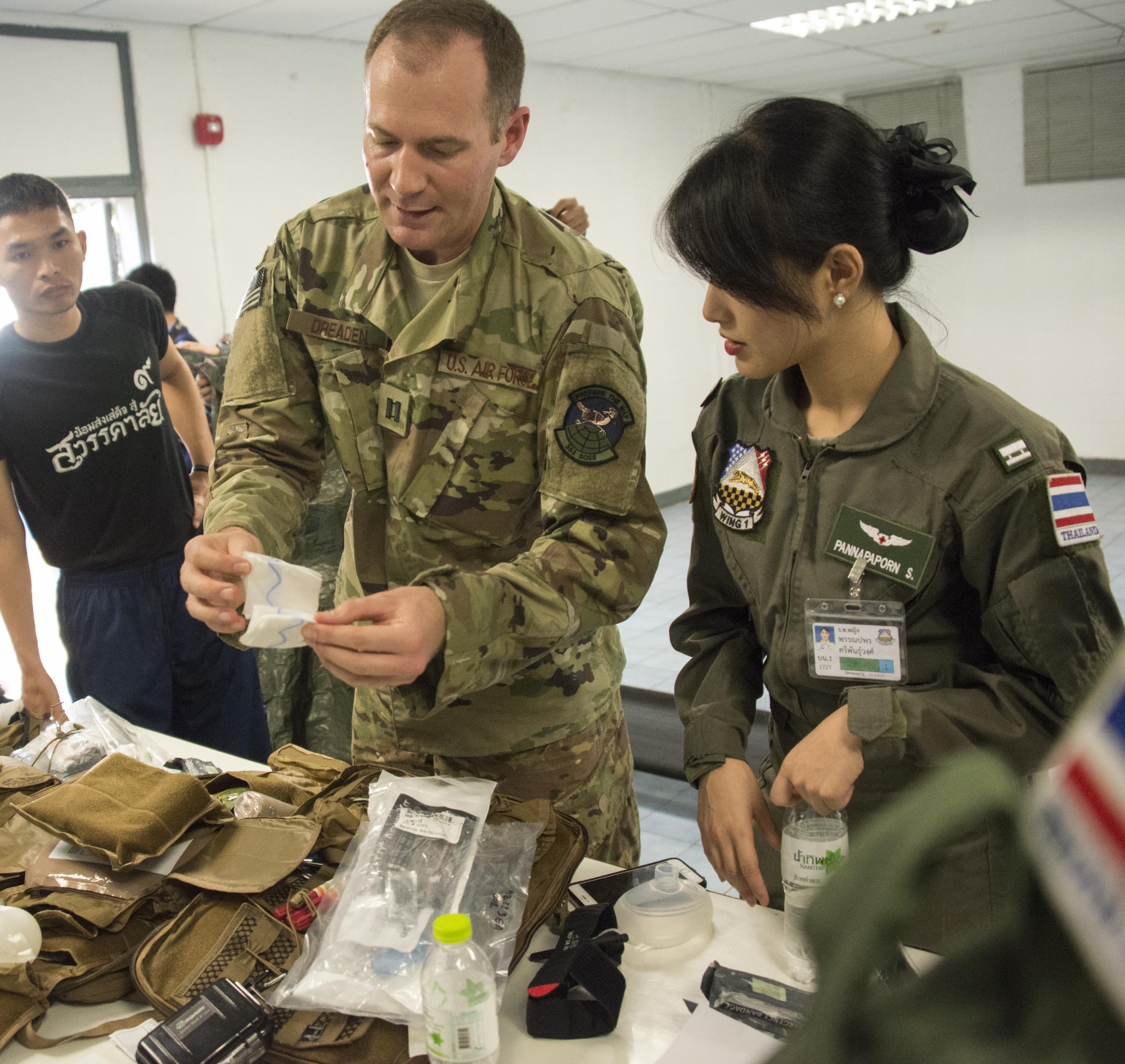 U.S. Air Force Capt. Zachary Dreaden, 353rd Special Operations Support Squadron flight surgeon, showcases his unit’s tactical medical gear to counterparts from the Royal Thai Air Force Wing 1 Hospital, Feb. 22, 2017 at Korat Air Base, Thailand. The RTAF medical exchange during Cobra Gold 2017 offered an opportunity to advance interoperability and increase partner capacity. (U.S. Air Force photo by Capt. Jessica Tait)