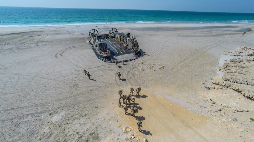 SENOOR BEACH, Oman (Feb. 15, 2017) U.S. Marines and Sailors with the Makin Island Amphibious Ready Group and 11th Marine Expeditionary Unit offload from a Landing Craft Air Cushion at Senoor Beach, Oman, before the beginning of Exercise Sea Soldier, Feb. 15. Sea Soldier 2017 is an annual, bilateral exercise conducted with the Royal Army of Oman designed to demonstrate the cooperative skill and will of U.S. and partner nations to work together in maintaining regional stability and security. USS Somerset, with the embarked 11th Marine Expeditionary Unit, is deployed in the U.S. 5th Fleet area of operations in support of maritime security operations designed to reassure allies and partners, preserve the freedom of navigation and the free flow of commerce and enhance regional stability.  (U.S. Marine Corps photo by Gunnery Sgt. Robert B. Brown Jr.)