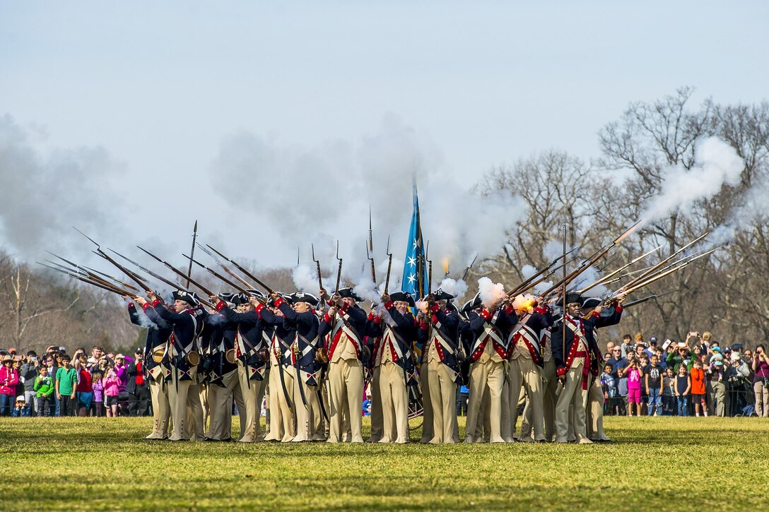 Soldiers assigned to the 3rd U.S. Infantry Regiment, known as "The Old Guard," perform a live-fire demonstration during a ceremony to mark President's Day at George Washington's Mount Vernon in Alexandria, Va., Feb. 20, 2017. Army photo by Zane Ecklund