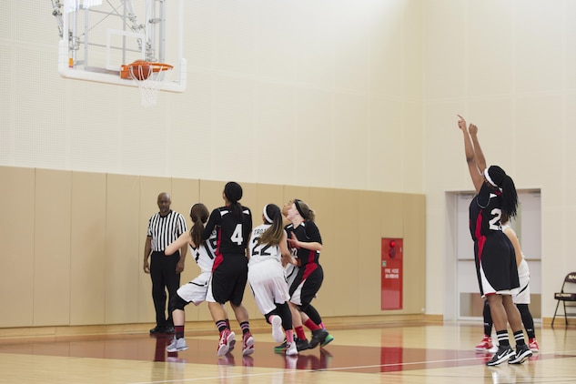 Annie Brown, a center with E.J. King High School’s Lady Cobra basketball team, makes a free throw during the 2017 Division 2 Girls’ Basketball Tournament at the Matthew C. Perry High School gym on Marine Corps Air Station Iwakuni, Japan, Feb. 23, 2017. M.C. Perry High School hosted 11 teams from the Far East Division for the tournament. The teams endured two days of physically demanding competition for the opportunity at a championship game in a double elimination style tournament. (U.S. Marine Corps photo by Lance Cpl. Joseph Abrego)