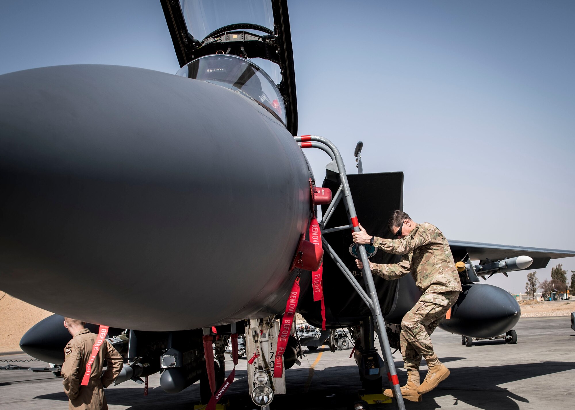 Gen. Joseph Votel, U. S. Central Command commander, debarks an F-15E Strike Eagle at an undisclosed location in Southwest Asia, Feb. 23, 2017. The general visited with Airmen and soldiers to see about the on-going operations in the region. (U.S. Air Force photo/Staff Sgt. Eboni Reams)