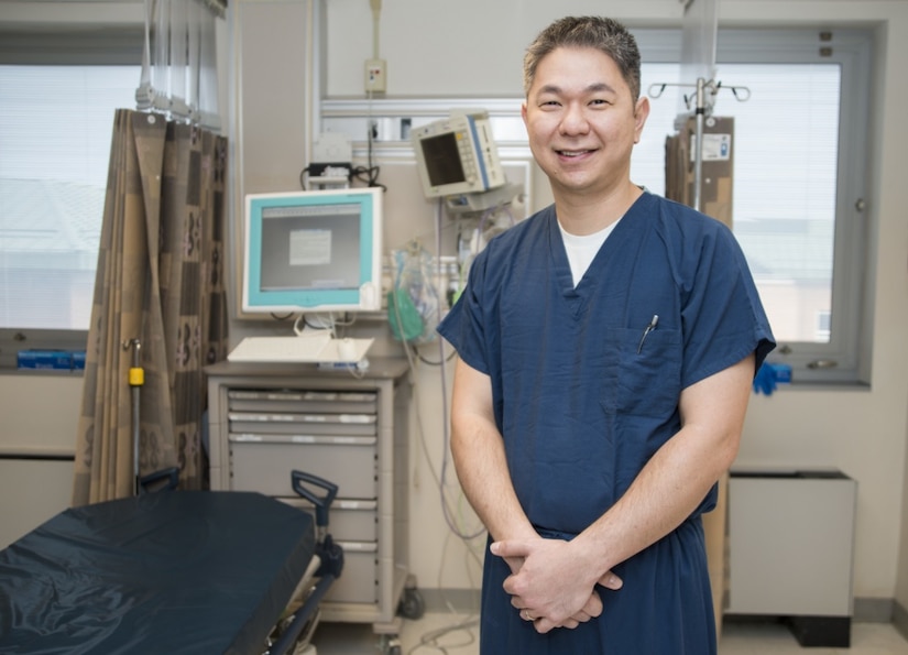 Navy Petty Officer 2nd Class Sutarto Soeng, a hospital corpsman, poses for photo at the Naval Medical Center in Portsmouth, Va., Feb. 10, 2017. Soeng was told that his name was on the list for the Medical Enlisted Commissioning Program, and he will receive the opportunity to achieve one of his lifelong dreams -- to become a Navy nurse. Navy photo by Petty Officer 1st Class Gary Johnson