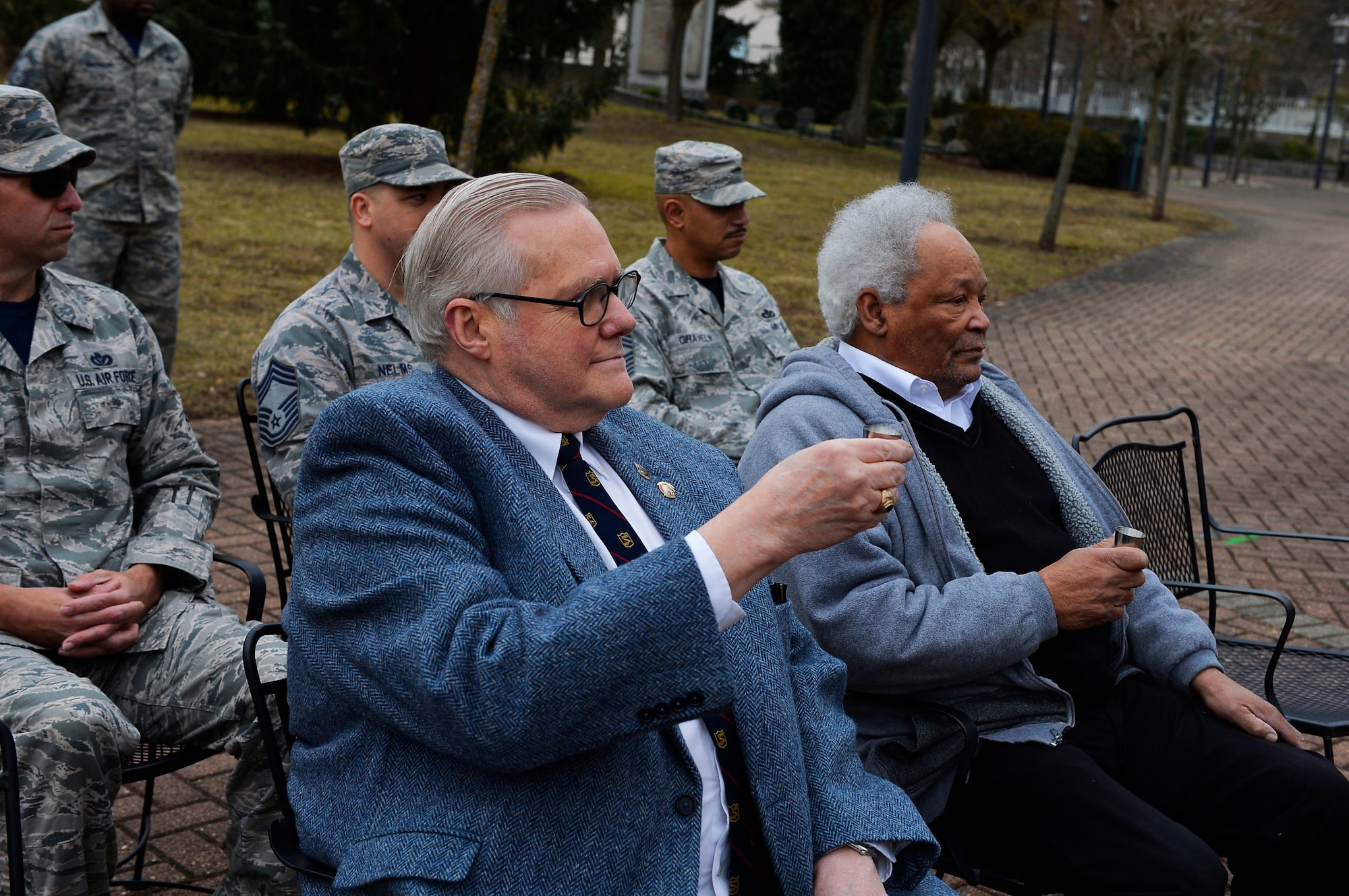 Vietnam War veterans and raise a toast during a memorial service for the River Rats Memorial monument on Ramstein Air Base, Germany, Feb. 17, 2017. The Red River Rats Fighter Pilots Association, which was comprised of those who flew missions over the Red River Valley in Vietnam, established the monument in 1976 to commemorate Airmen who never returned from the war. Of more than two million U.S. troops who served in Vietnam, more than 55,000 lost their lives. (U.S. Air Force photo by Airman 1st Class Joshua Magbanua)