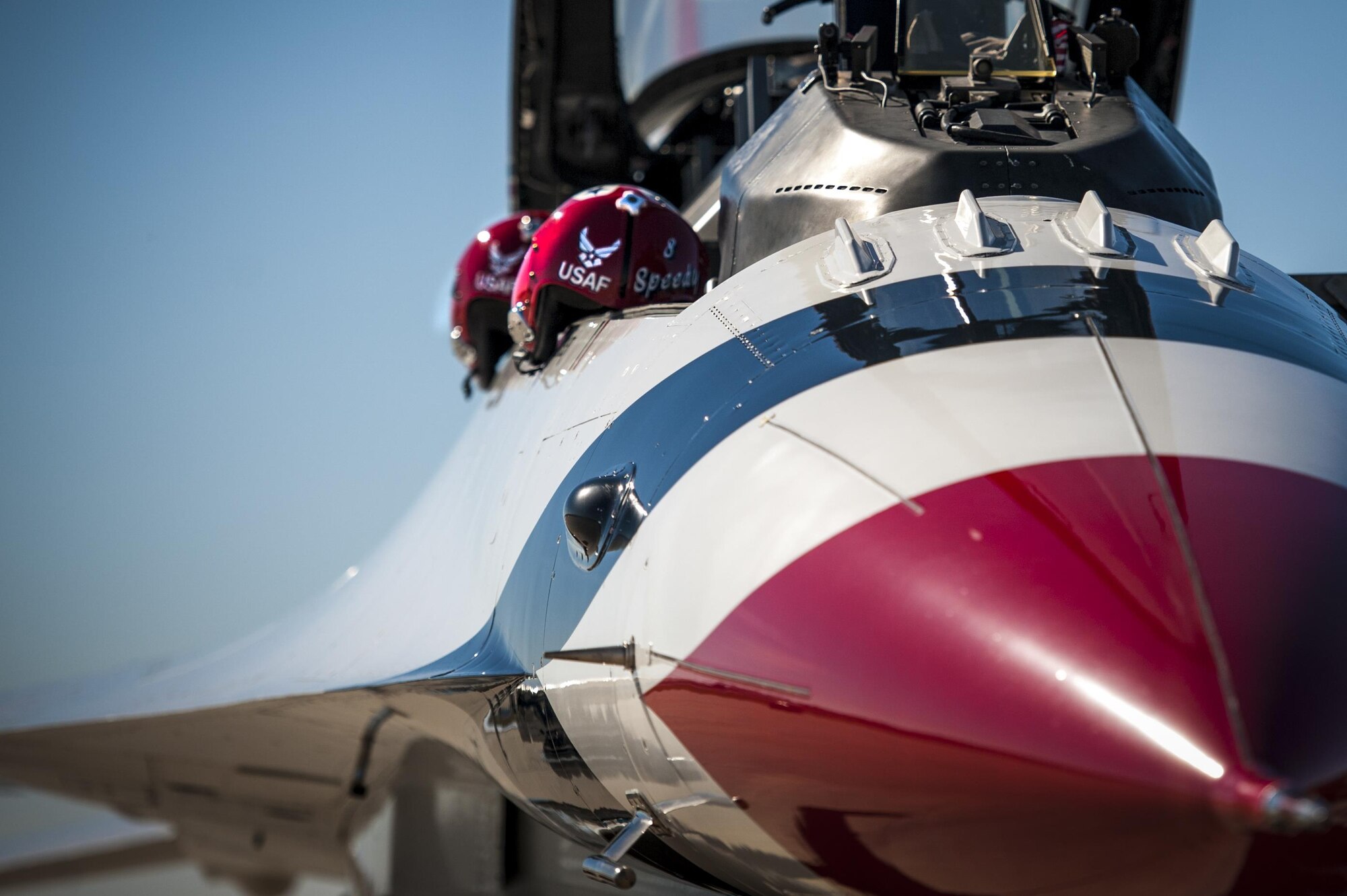 Helmets rest on the side of an F-16D Fighting Falcon Feb. 17, 2017, at Moody Air Force Base, Ga. The U.S. Air Force Thunderbirds are known as the “Ambassadors in Blue,” and will be representing the Air Force during the Thunder Over South Georgia Air Show in October 2017, at Moody AFB. (U.S. Air Force photo/Airman 1st Class Lauren M. Sprunk)