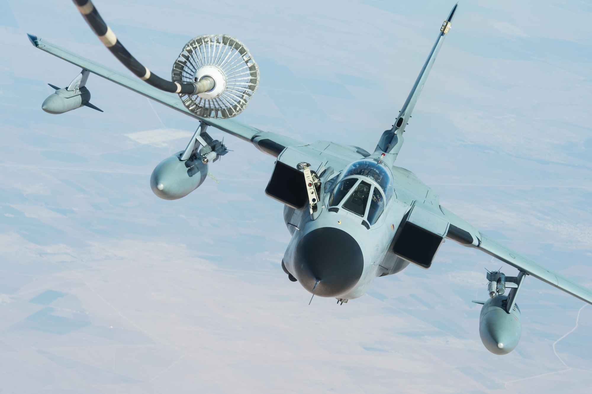 A German Tornado GR-4 receives fuel from a KC-10 Extender during a mission in support of Combined Joint Task Force-Operation Inherent Resolve over Iraq, Feb. 22, 2017.The KC-10 offloaded 126,000 pounds of fuel to multinational coalition aircraft working to weaken and destroy the Islamic State of Iraq and Syria operations in the Middle East region and around the world. (U.S. Air Force photo/Senior Airman Tyler Woodward)