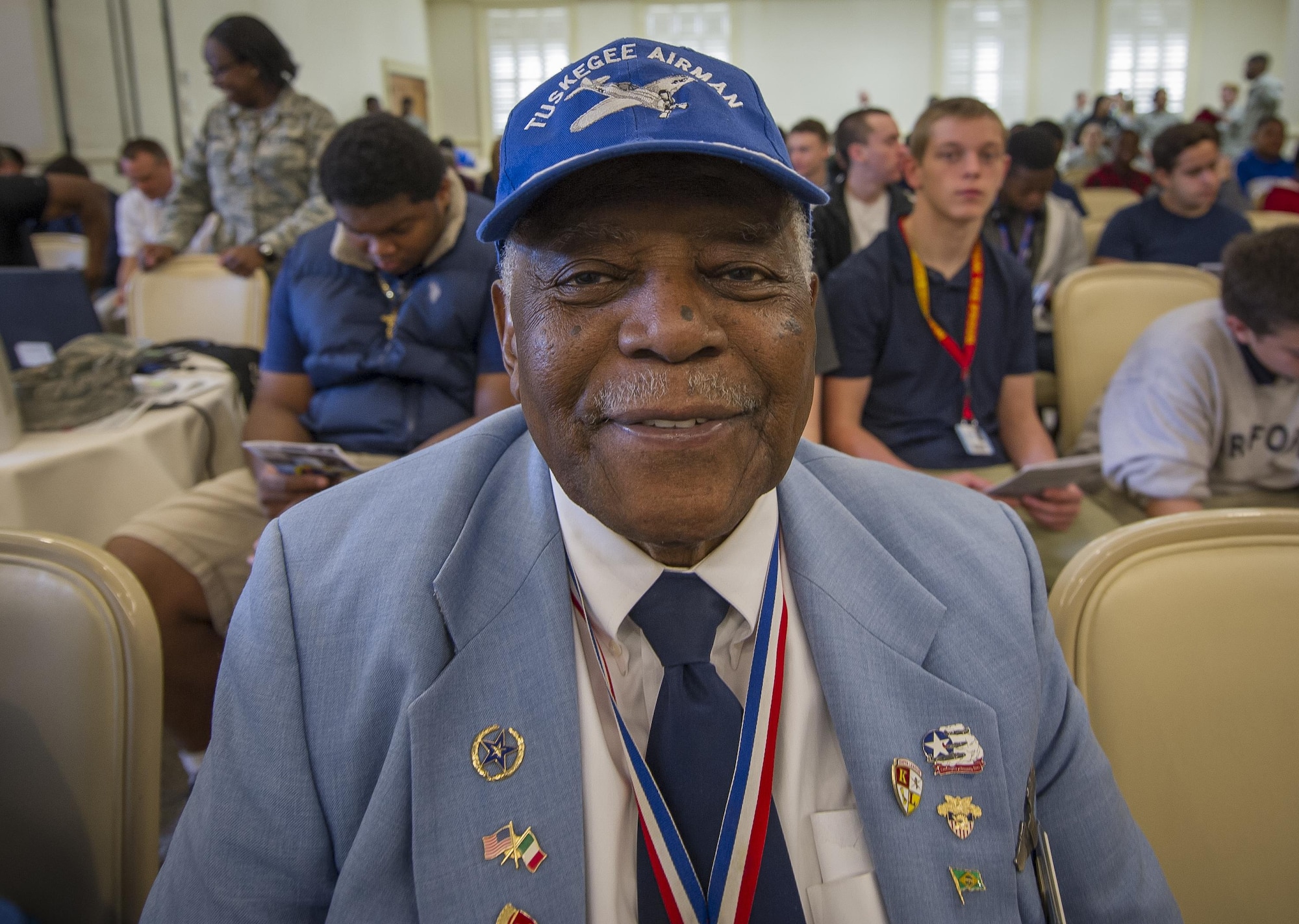 Former 2nd Lt. and original Tuskegee Airman, Dr. Eugene Richardson, Jr. awaits the guest speaker Feb. 23, 2017, the morning of the Tuskegee Airmen Career Day at Joint Base Charleston, S.C. More than 150 students from middle and high school boys from 17 Lowcountry school visited Joint Base Charleston Feb. 23, 2017, to learn about jobs in aviation as part of the second annual Tuskegee Airmen Career Day, hosted by the 315th Airlift Wing. The boys were able to learn about military and civilian careers in aviation by more than 15 different career fields. (U.S. Air Force photo by Senior Airman Tom Brading)