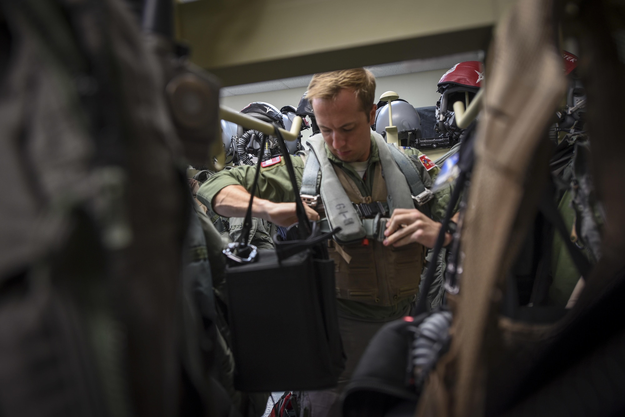 Capt. Chris Dubois, a 67th Fighter Squadron F-15 Eagle pilot, prepares for flight during exercise Cope North Feb. 20, 2017, at Andersen Air Force Base, Guam. The equipment is maintained and inspected by Airmen from the 18th Operations Support Squadron, who ensure life-saving gear will work properly in the event of an emergency. (U.S. Air Force photo/Senior Airman John Linzmeier)