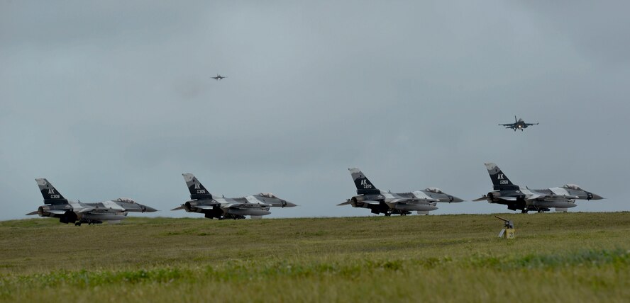 F-16 Fighting Falcons assigned to the 18th Aggressor Squadron at Eielson Air Force Base, Alaska, prepare to take off during exercise Cope North 2017 at Andersen Air Force Base, Guam, Feb. 16, 2017. The exercise is designed to increase combat readiness between the United States, Australia and Japan. Cope North includes fighter versus fighter air combat tactics training and air-to-ground strike mission training. (U.S. Air Force photo/Airman 1st Class Christopher Quail)