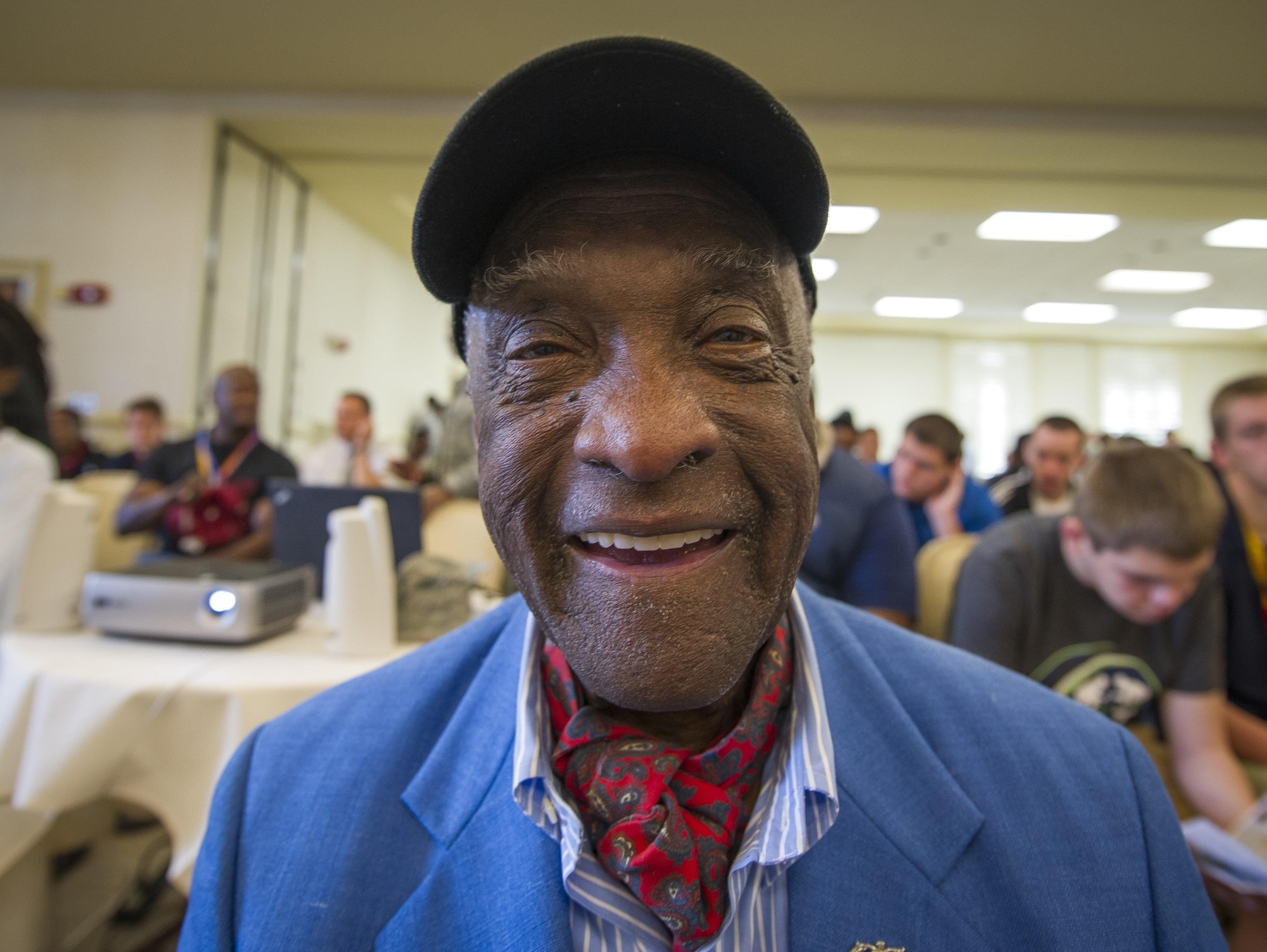 (Ret.) Lt. Col. Enoch “Woody” Woodhouse, an original Tuskegee Airman, awaits the guest speaker Feb. 23, 2017, the morning of the Tuskegee Airmen Career Day at Joint Base Charleston, S.C. More than 150 students from middle and high school boys from 17 Lowcountry school visited Joint Base Charleston Feb. 23, 2017, to learn about jobs in aviation as part of the second annual Tuskegee Airmen Career Day, hosted by the 315th Airlift Wing. The boys were able to learn about military and civilian careers in aviation by more than 15 different career fields. (U.S. Air Force photo by Senior Airman Tom Brading)