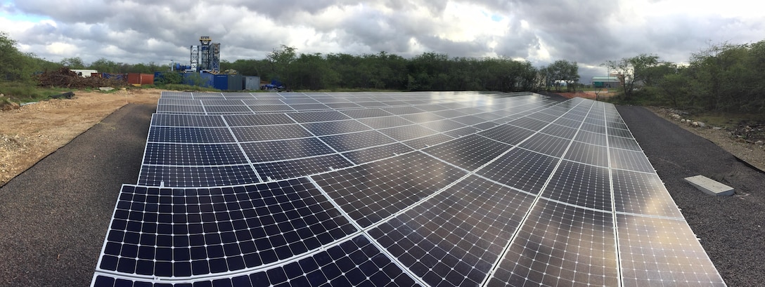 A newly-installed 134 kW photovoltaic array at Joint Base Pearl Harbor-Hickam, Hawaii, is part of the Pacific Energy Assurance and Resiliency Laboratory, a renewable energy microgrid project demonstrating new ways for military facilities to address energy needs. (Photo courtesy of HNU Energy/Joseph Cannon)
