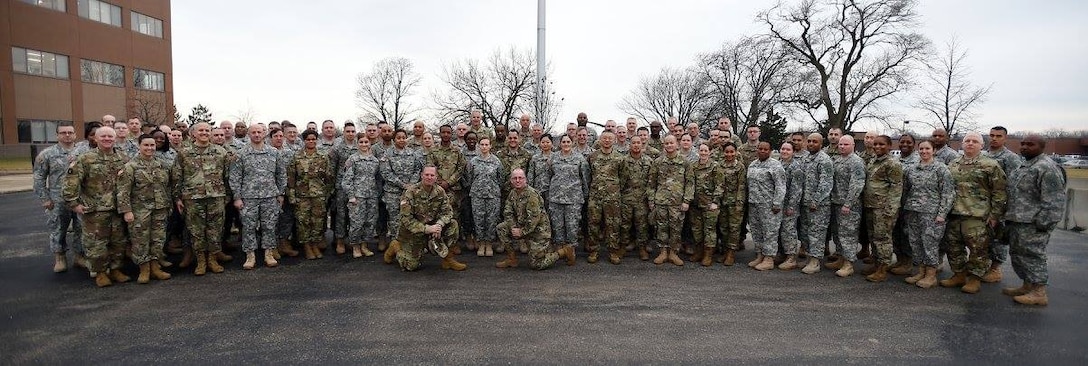 Brig. Gen. Frederick R. Maiocco, Jr. Commanding General, 85th Support Command with Command Sgt. Maj. Vernon Perry, Command Sergeant Major, 85th Support Command, pause for a photo with the headquarters staff following a Black History Month presentation during the weekend battle assembly training, Feb. 11, 2017.
(Photo by Sgt. Aaron Berogan)