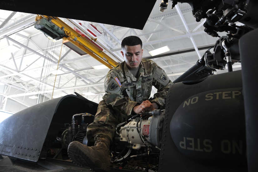 Aircrew members from the Army Reserve Aviation Command conduct pre-flight and maintenance checks on a UH-60 Blackhawk helicopter, Aug. 30. (Photos by Fort Knox Visual Information) 