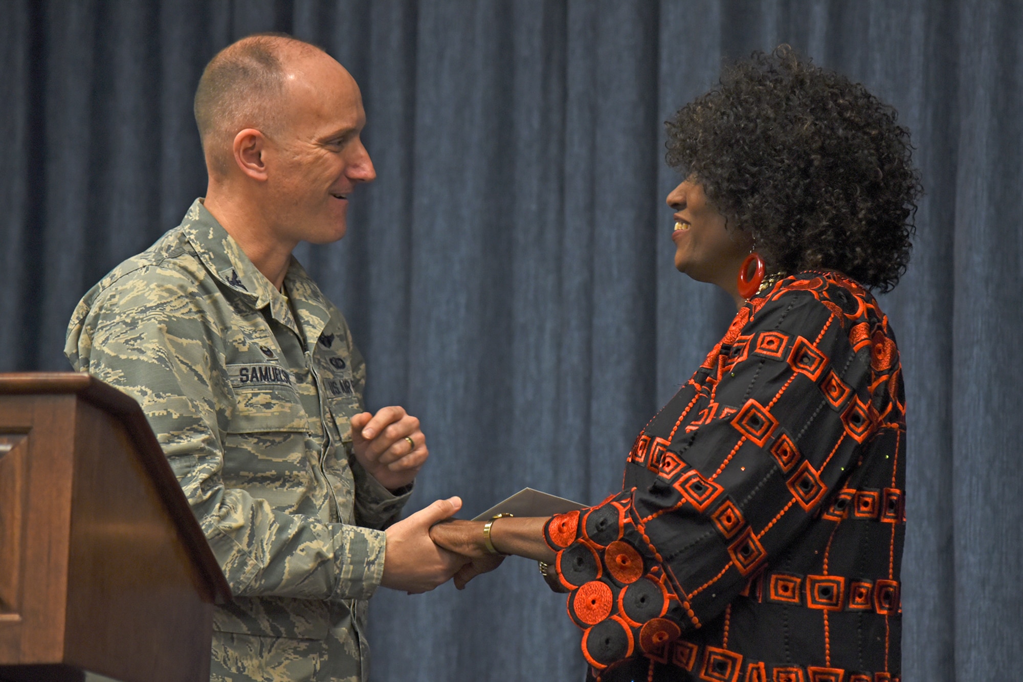 Col. Ryan Samuelson, 92nd Air Refueling Wing commander, thanks Stephanie Nobles-Beans, coordinator for Diversity, Equity and Inclusion for Campus Ministries at Whitworth University, for her contribution to the National Black History Month luncheon Feb. 23, 2017, at Fairchild Air Force Base, Washington. Nobles-Beans spoke on the importance of instilling self-confidence and knowledge of endless possibilities into education and today’s youth. (U.S. Air Force photo/Senior Airman Mackenzie Richardson)
