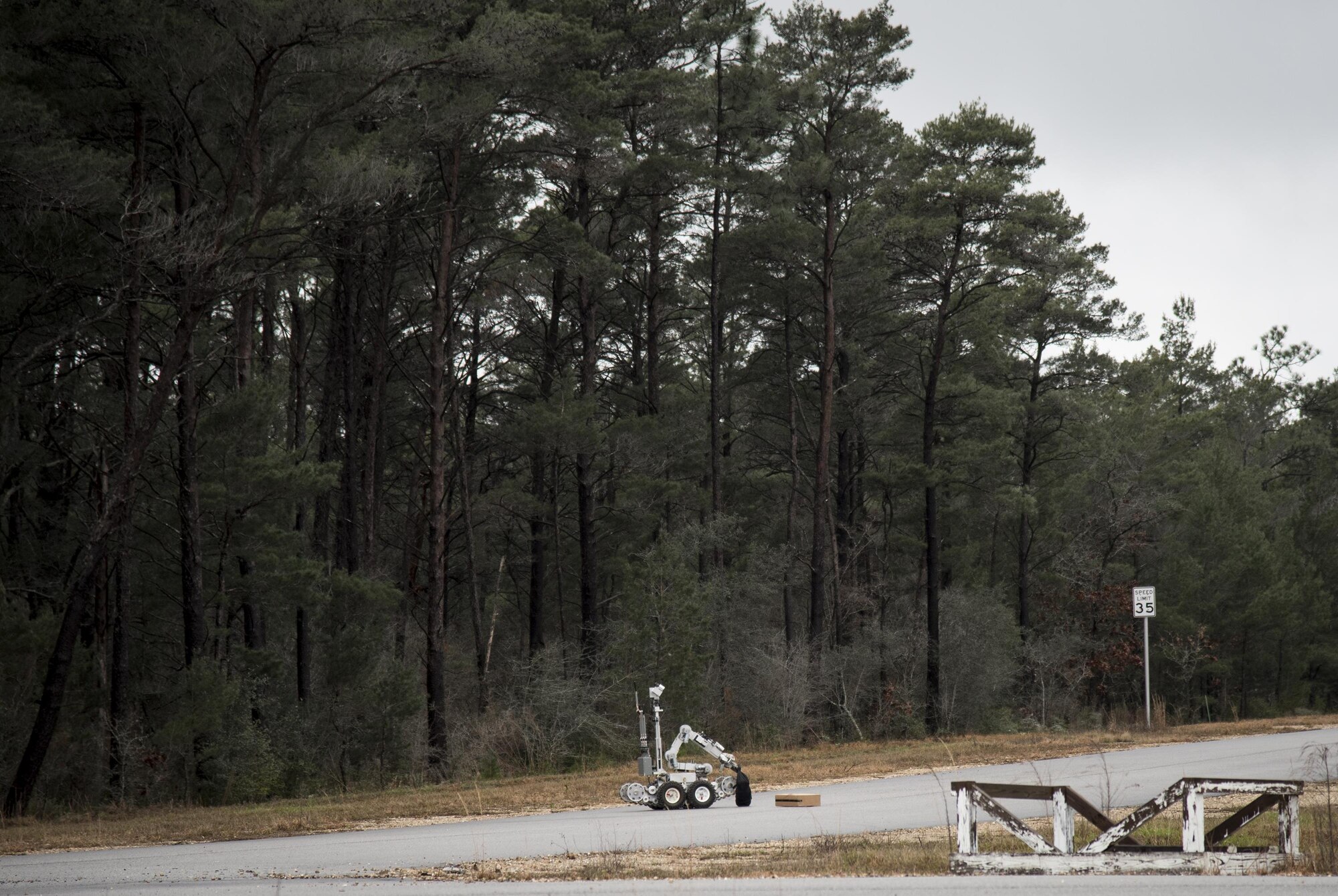 An explosive ordnance disposal robot approaches a suspicious package during an exercise Feb. 22 at Eglin Air Force Base, Fla.  The chemical, biological, nuclear response exercise tested the procedures of emergency response, explosive ordnance disposal, emergency management and bioenvironmental agencies among others.  (U.S. Air Force photo/Samuel King Jr.)