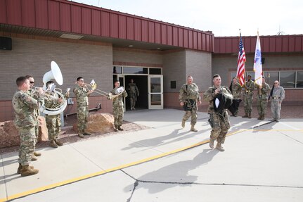 Soldiers assigned to the 207th Engineer Company, Kentucky Army National Guard, and the 215th Engineer Company, Puerto Rico Army National Guard, walk to the aircraft that will transport them to the Middle East at the Silas L. Copeland Arrival/Departure Airfield Control Group here Feb. 3 in support of Operation Freedom’s Sentinel.