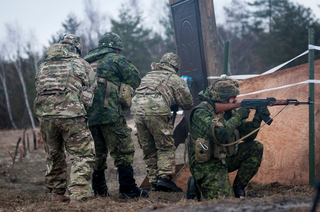 U.S. Army and Canadian engineers prepare to breach a door while training with Ukrainian combat training center engineers near Yavoriv, Ukraine, Feb. 24, 2017. Army photo by Sgt. Anthony Jones