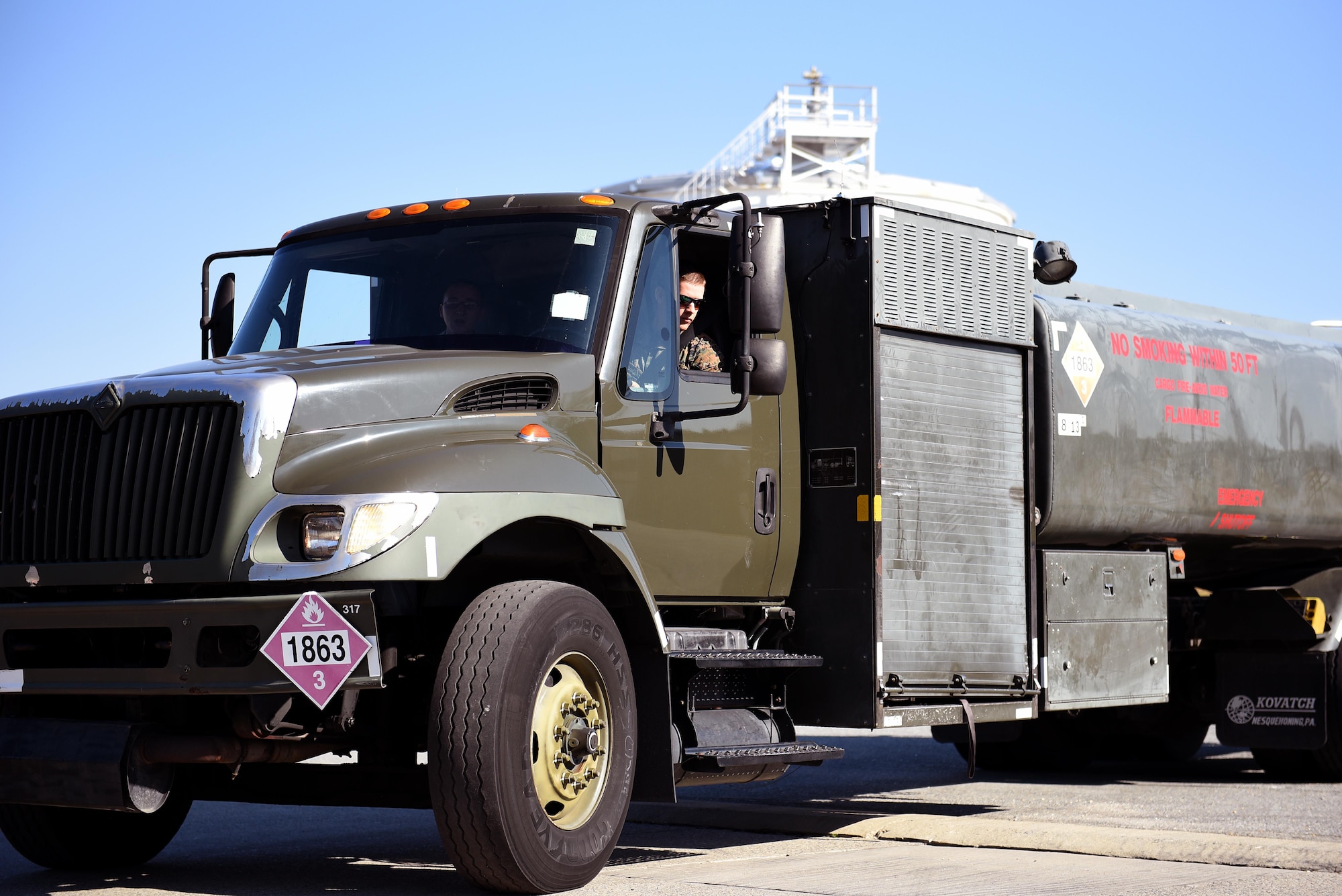 An Airman and a Marine practice driving the R-11 aircraft refueler Nov. 16, 2016, at Seymour Johnson Air Force Base, North Carolina. Seymour Johnson AFB is one of the test sites for a new program to turn government vehicle operator certifications into commercial driver’s licenses. (U.S. Air Force photo by Airman 1st Class Kenneth Boyton)