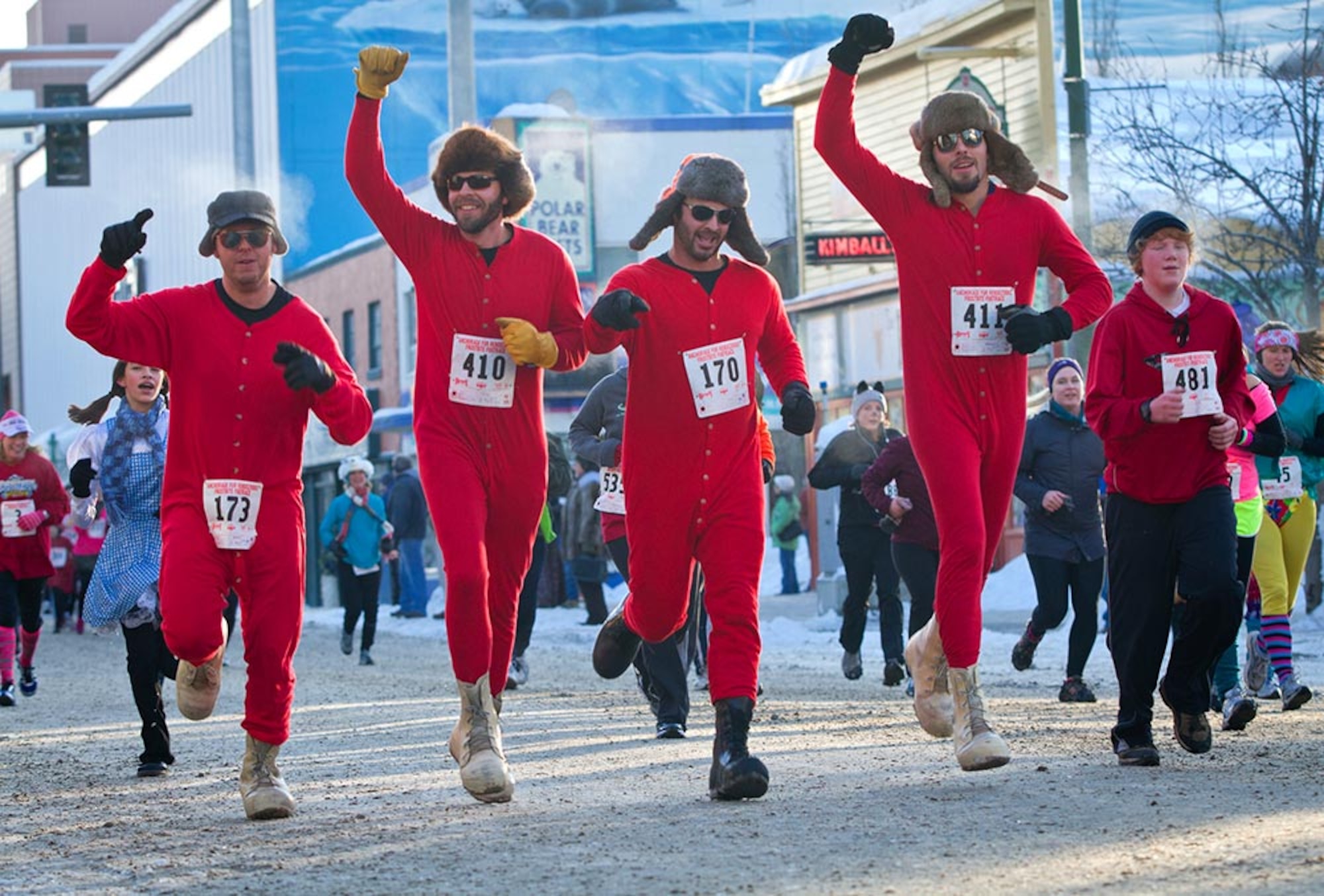 Participants run a 5K during the Frostbite Footrace event at the annual Fur Rendezvous winter festival in Anchorage. The festival has been a significant part of Anchorage’s history since 1935. 