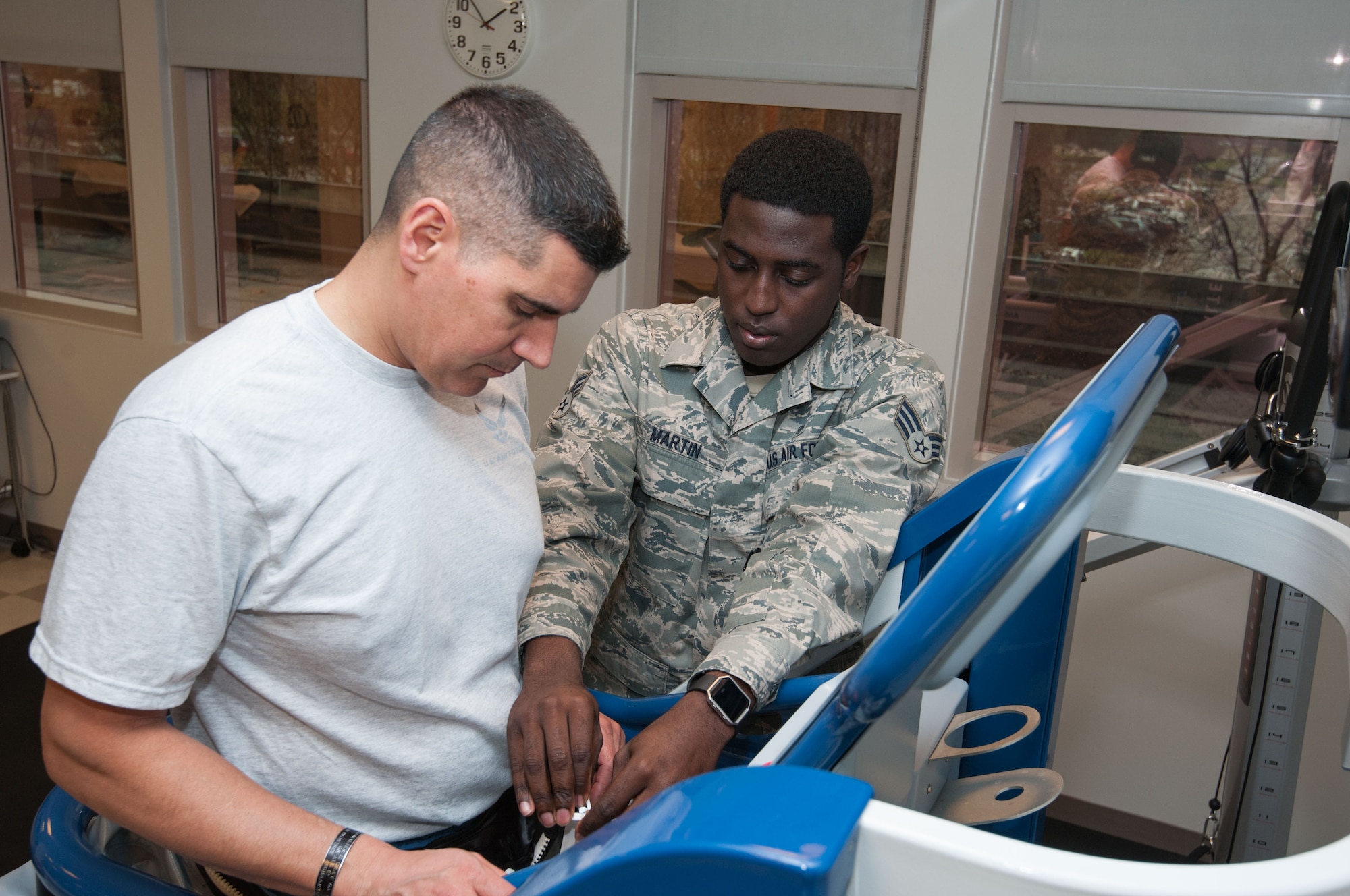 Col. Eric Shafa, 42d Air Base Wing commander, learns how to operate an Anti Gravity Treadmill during a visit to the 42d Medical Operations Squadron on Feb 21, 2017.  Senior Airman Donald Martin walked the command team through various exercises his team does daily in the physical therapy section.  (US Air Force photo by Bud Hancock)