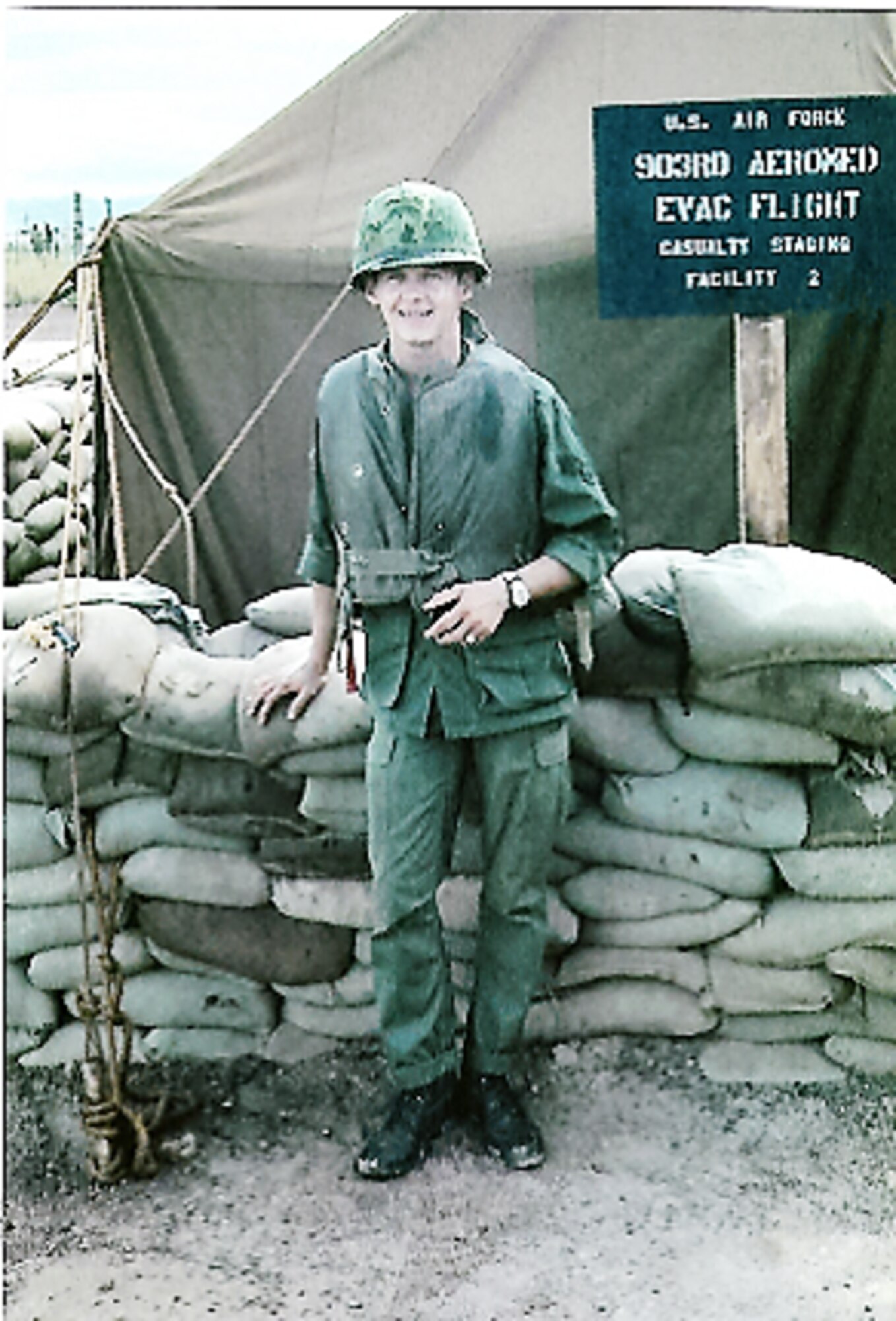 Retired Chief Master Sgt. Charles Fox, who served as an aeromedical evacuation technician in the 903rd Aeromedical Evacuation Flight stands in front of the casualty staging tents adjacent to a forward army medical facility at Duc Pho in 1967. (Contributed Photo)